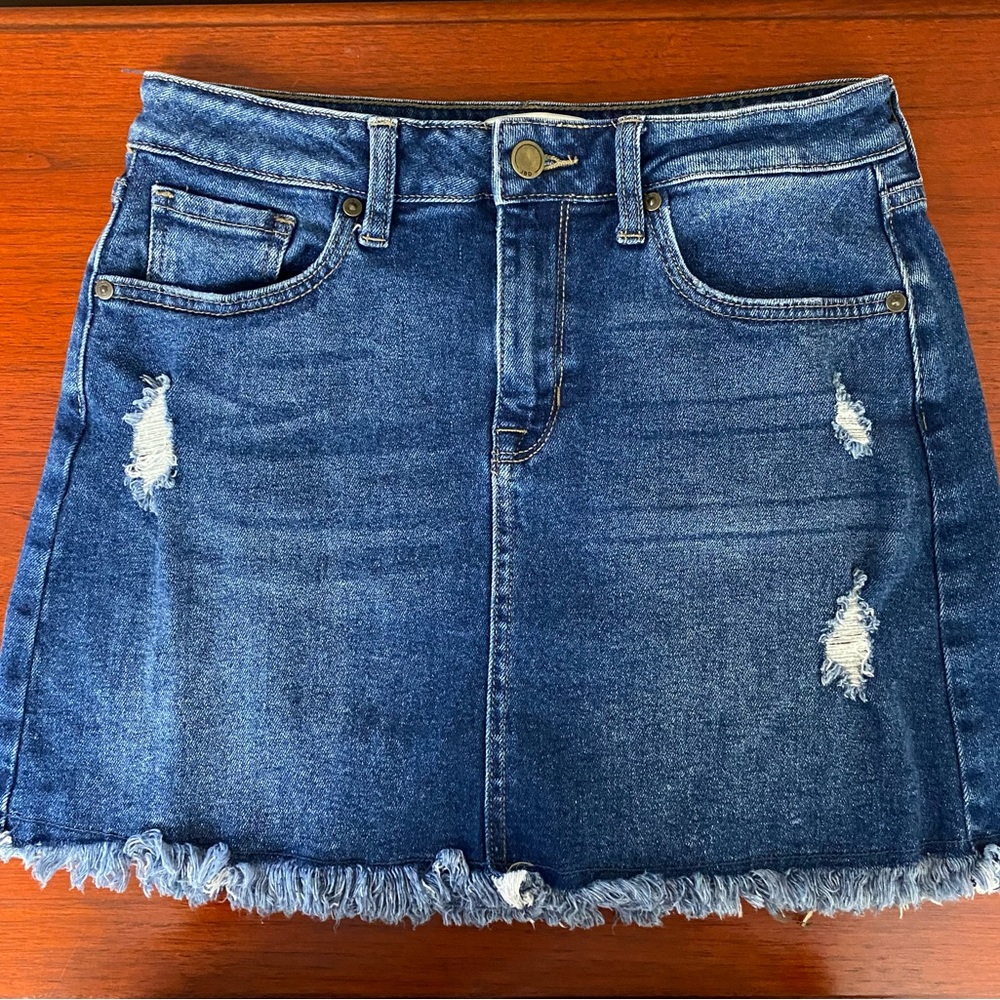 Just Black Denim mini skirt with frayed hem.  Ladies size Small